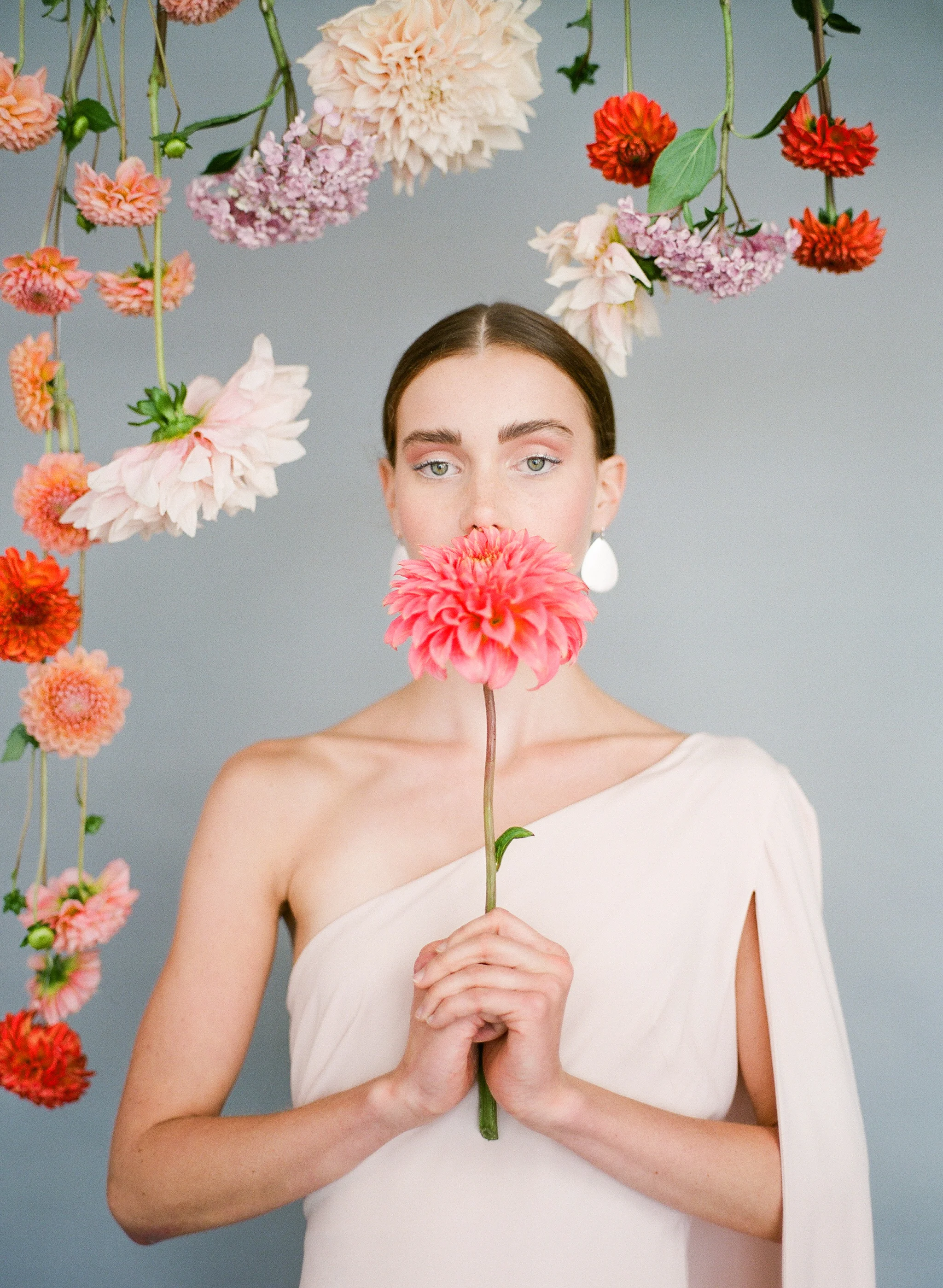 Photography @tmilophoto Styling @type_a_society Gowns (the two lace gowns using the blue backdrop) @clairepettibone Pink gown for colorful scene and gray backdrop - @jilljillstuart Florals @aubrianak Model @chloe.janssen Model Agency @lookmodelagency Film Scans @richardphotolab MUA @artistrybydanika and @igotyourpretty 