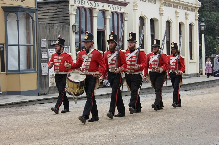 Soldiers marching down Main Street.