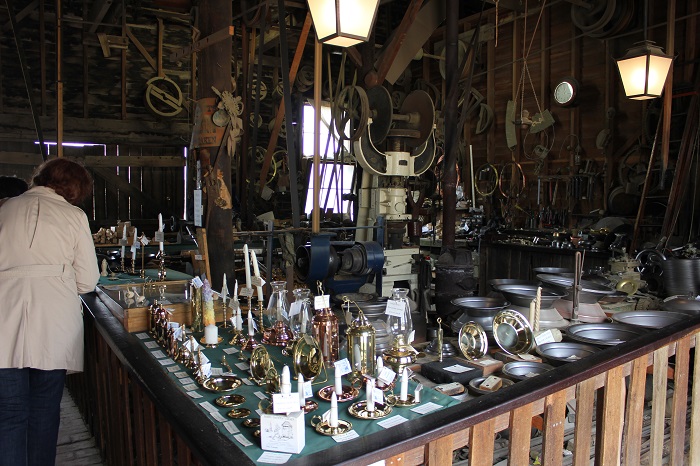 His wares for sale. $30 for an iron frying pan you can watch him make isn't bad.