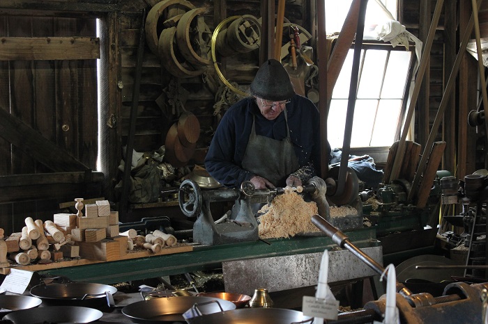 The founder at work building a handle.