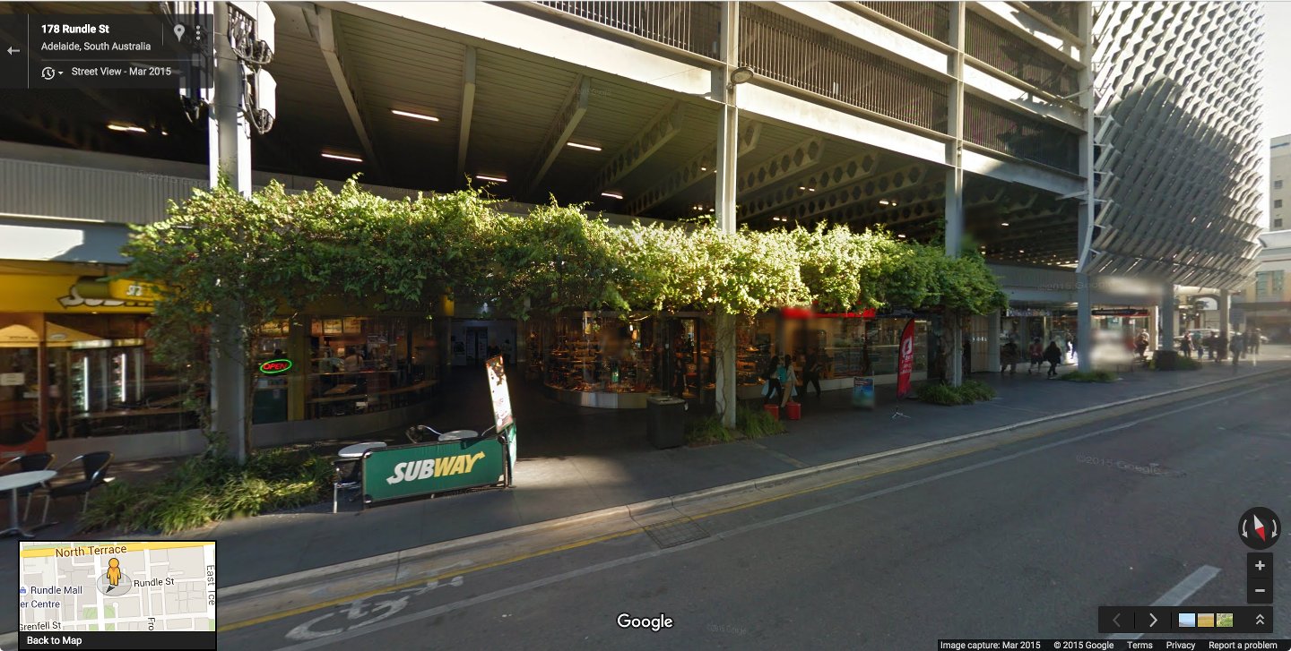 A large multi-story parking structure in Adelaide, Australia (I am using an example from the otherside of the world here, but it was the quickest example that came to mind.) There is no excuse why you should have blank walls and dead streets.