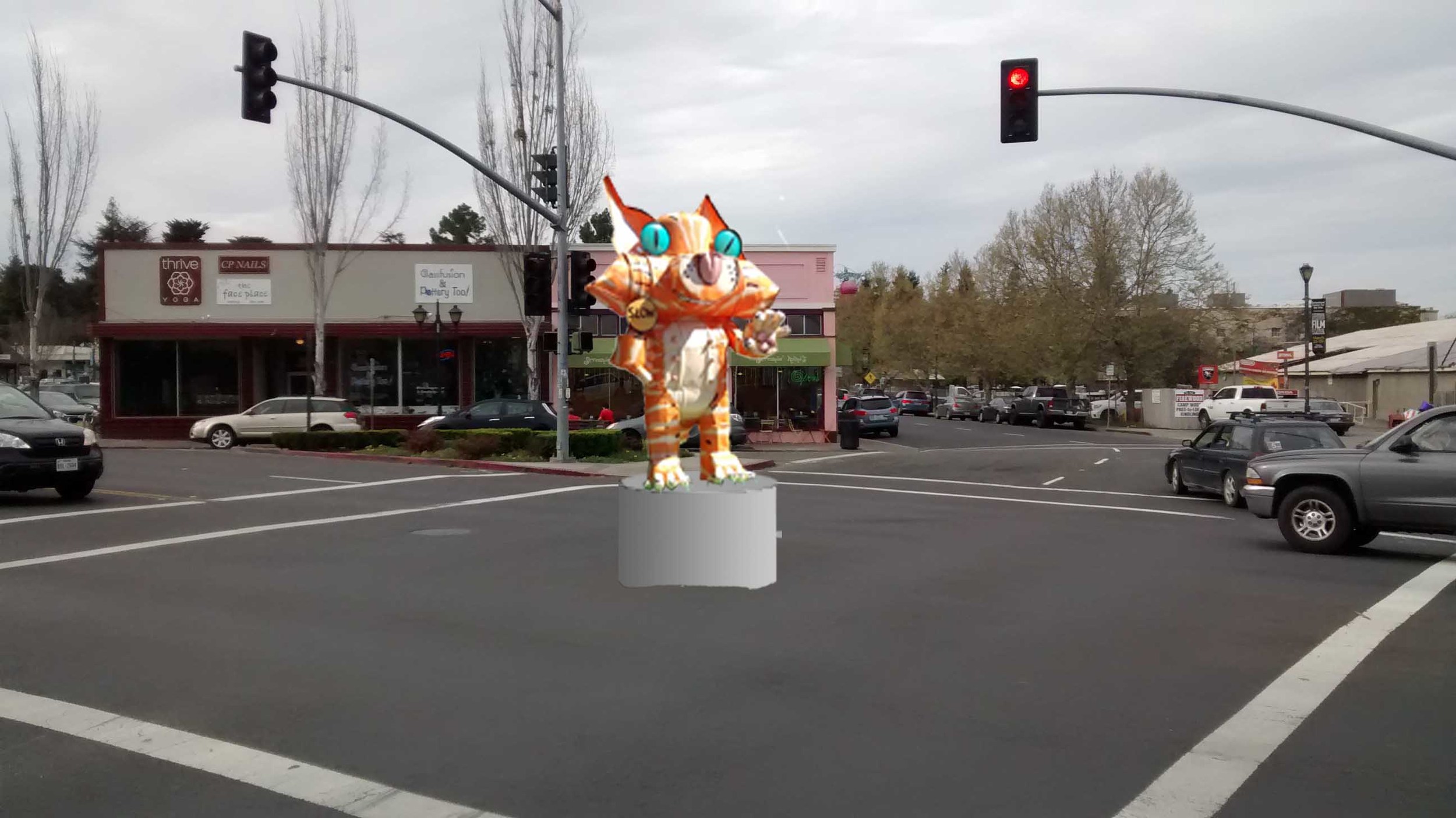 This is an artist's rendition. Unfortunately the city doesn't actually have the guts to put the cat in the middle of intersections, just off to the side so that drivers can easily speed past it.