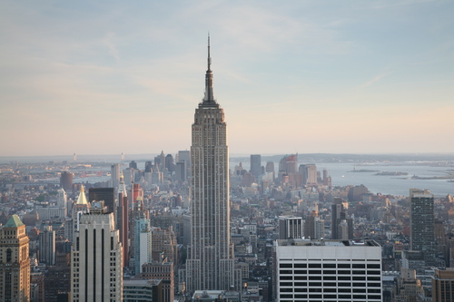 There is no chance that the Empire State Building will be abandoned because the street in front of it can't be maintained. You can't say the same about your suburban tract house.