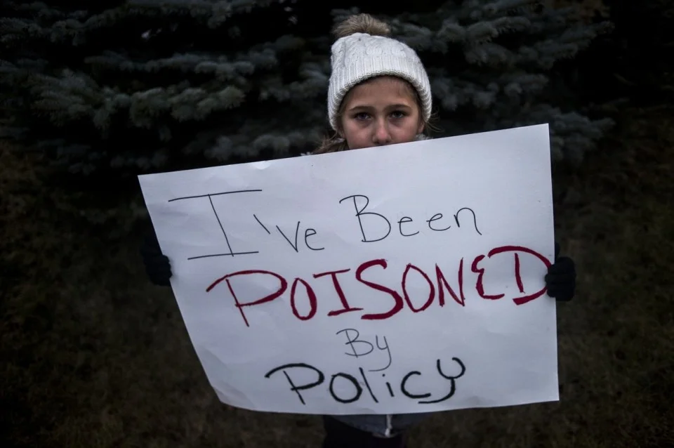 Image from www.mlive.com/news/flint/index.ssf/2016/01/more_than_150_call_for_gov_ric.html