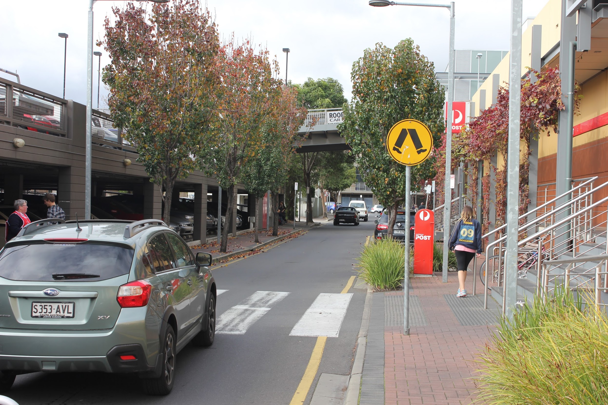 A one-way street in Adelaide with a crossing halfway up the block. A slightly better solution, but how often should we place the crossings? What if we wanted the entire street to be a crossing?