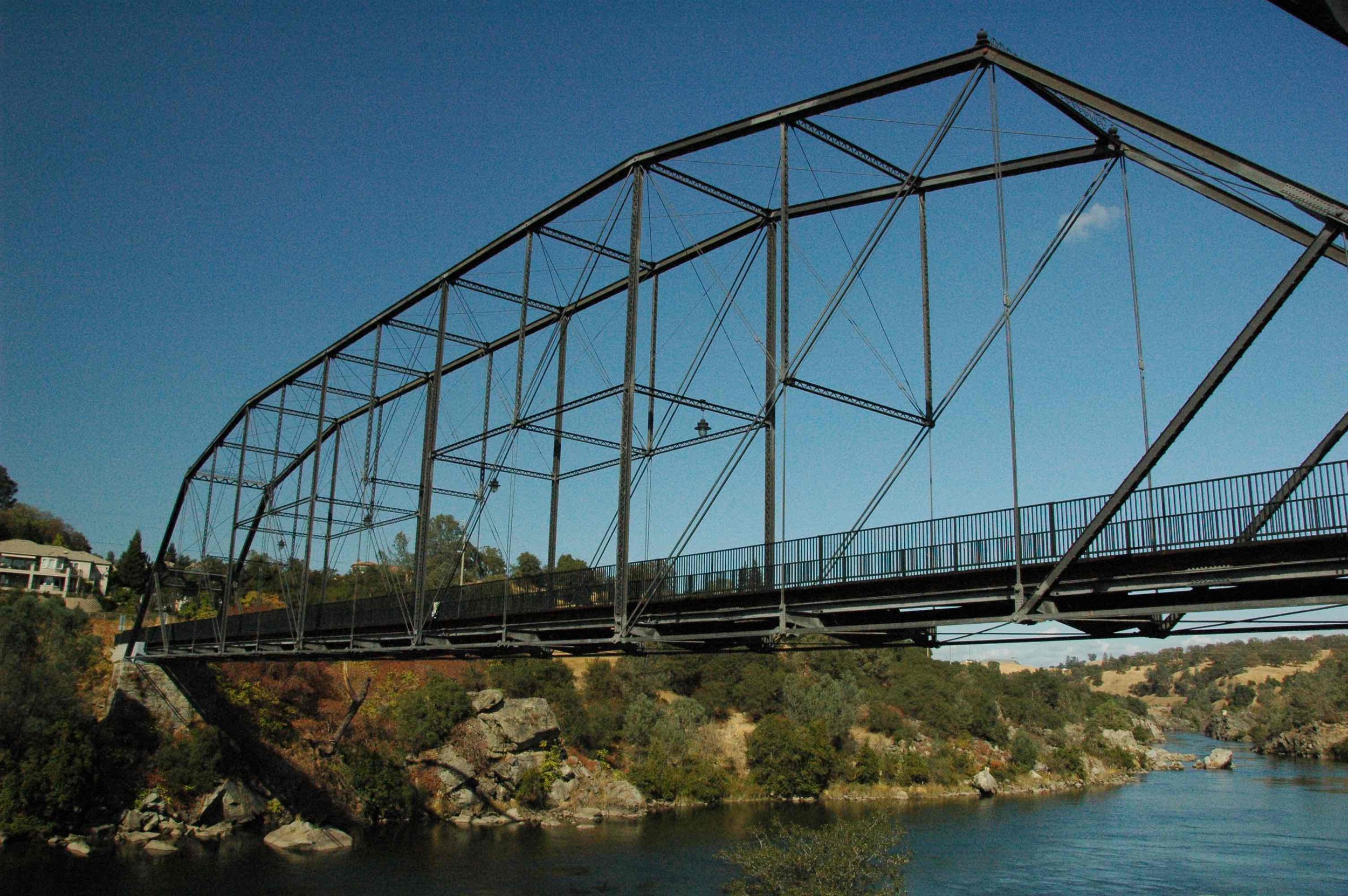 Formerly a bridge for horse-drawn carts, this truss bridge near Folsom, CA has been converted for use by bike and pedestrians. ( Photo courtesy of Dave Alden.)
