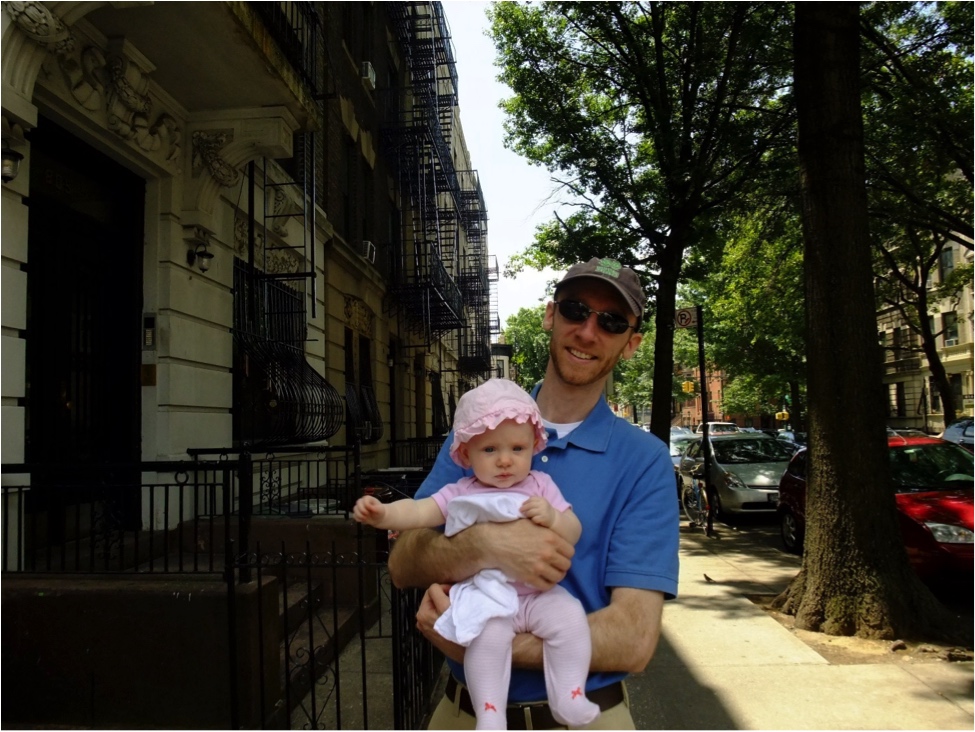 My husband John with our first baby girl two years ago in our neighborhood in Brooklyn, NY