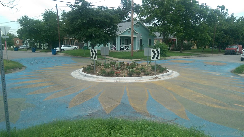 A colorful traffic circle/garden