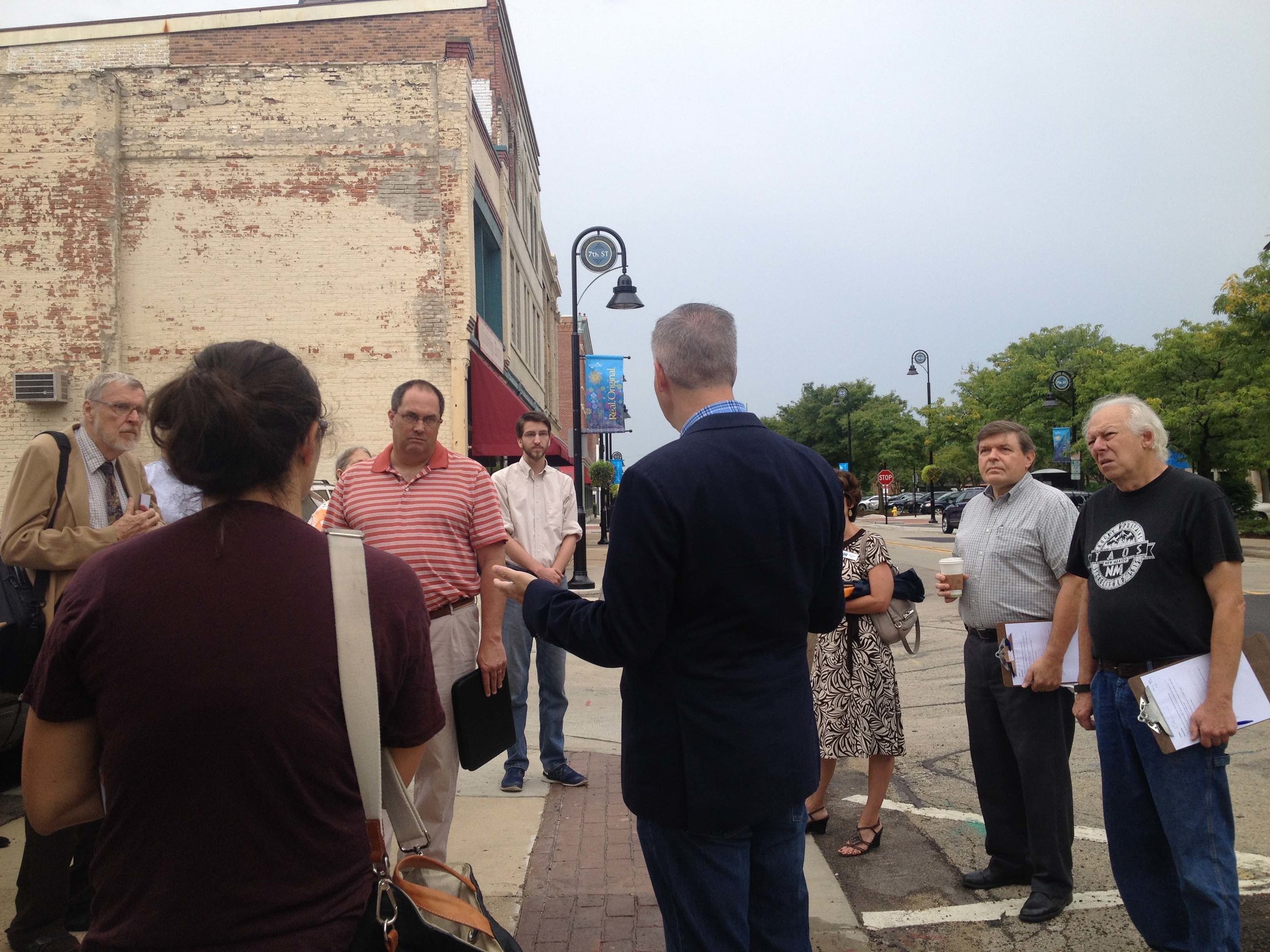 Chuck speaks during a walking tour in Rockford.