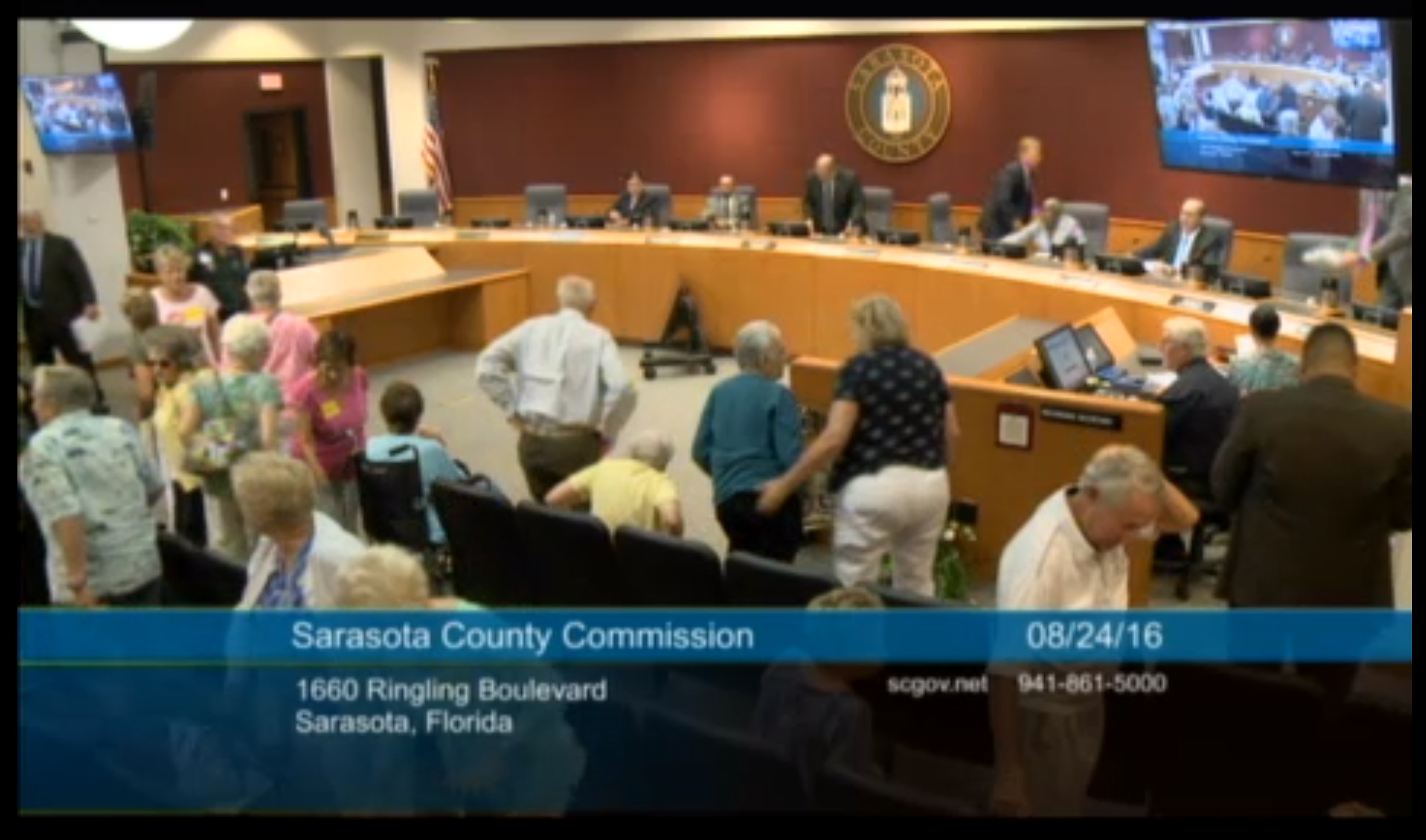 Residents stand up at the end of the public hearing. Source: Sarasota County Commission