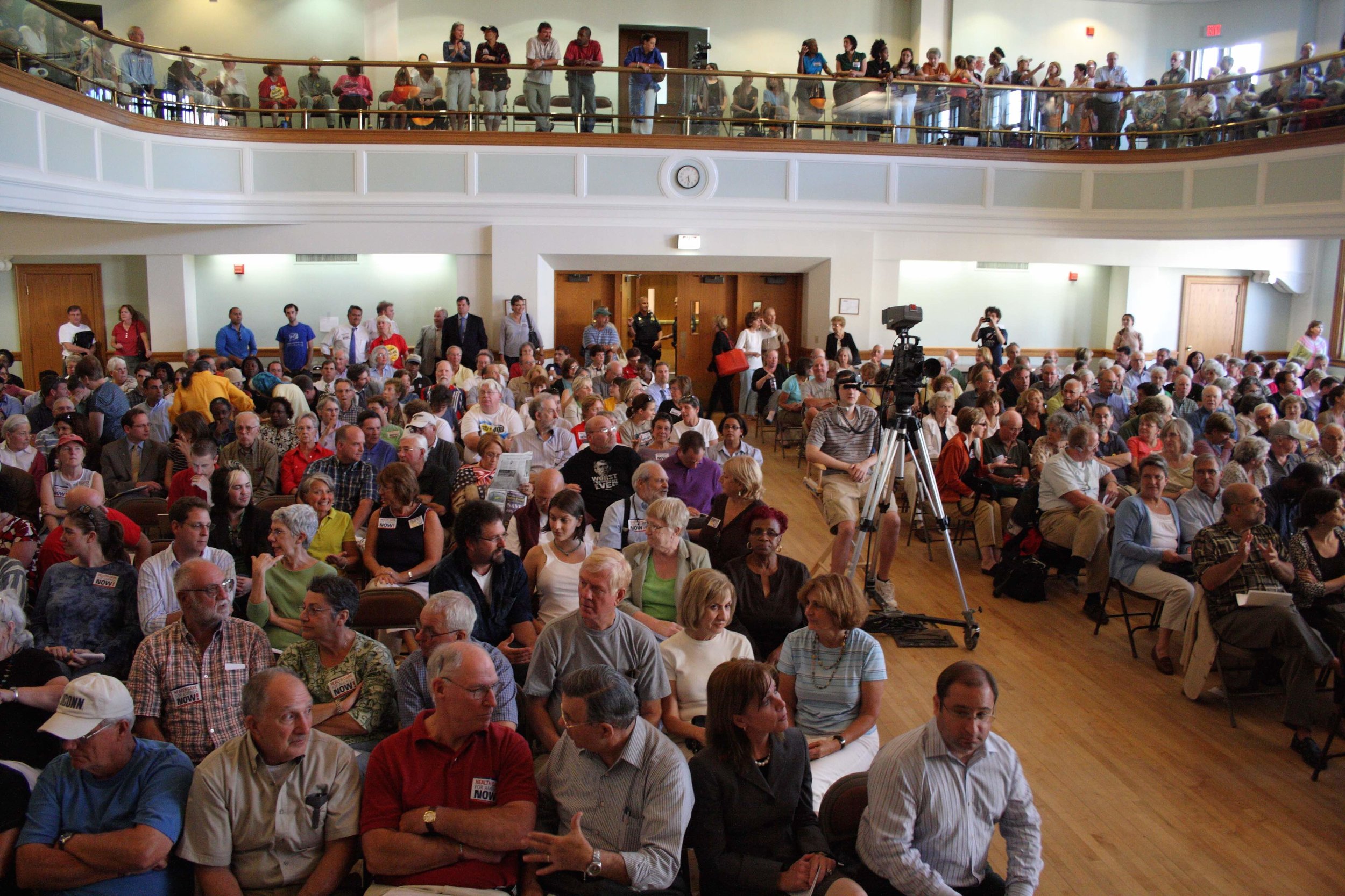 Not sure why these folks are at this meeting, but they're definitely angry about something or they wouldn't be. Source: Wikipedia
