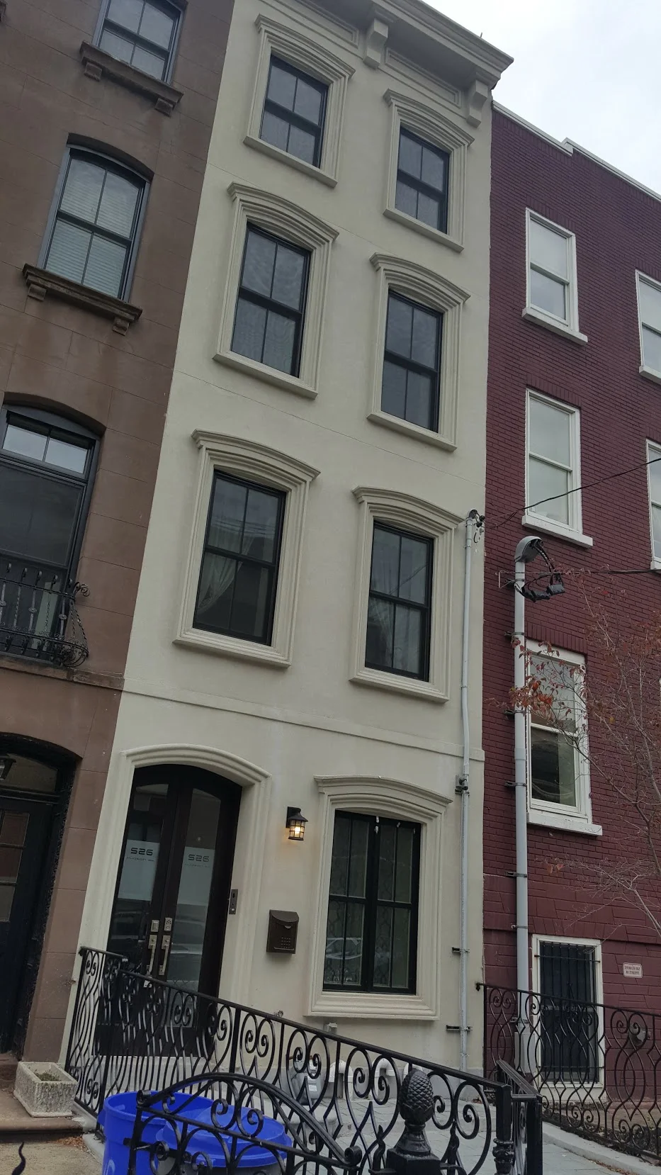 A townhome in Hoboken, NJ. Its character would be completely different if the ground level were a garage door.