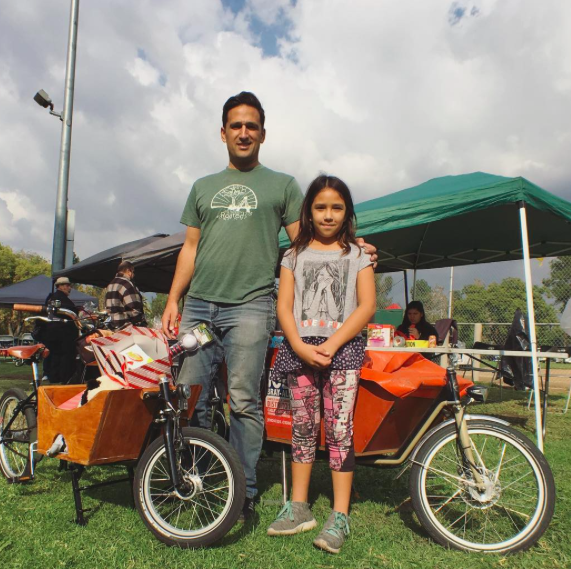 Joe and his daughter and their bikes