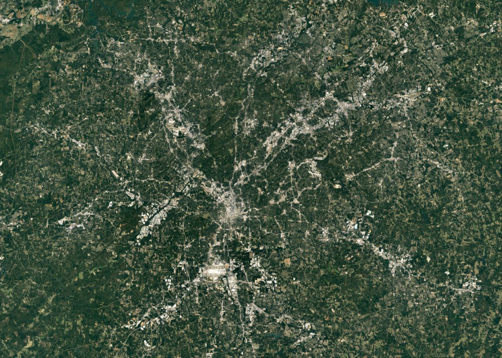 Atlanta metropolitan area, current-day satellite photo from Google Maps. City size determined by 30-minute driving distance.