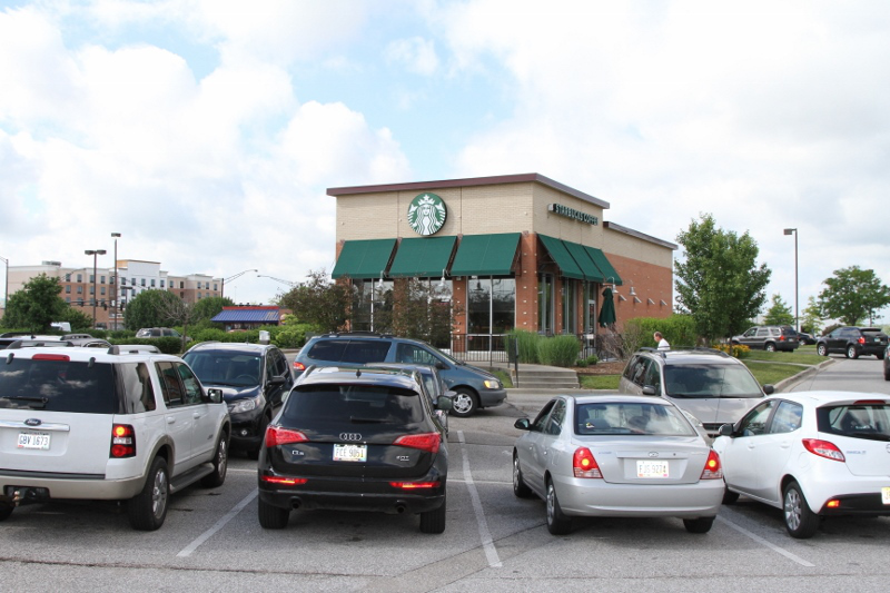 Can this really become something more than a parking lot and a Starbucks? If it could, would the cost be worth it? (Photo by Johnny Sanphillippo)