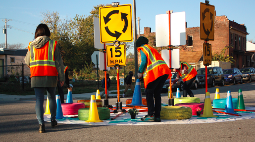 Trailnet sets up a mini roundabout for a traffic calming demonstration (Source: Trailnet's How-to Guide for Pop Up Traffic Calming )