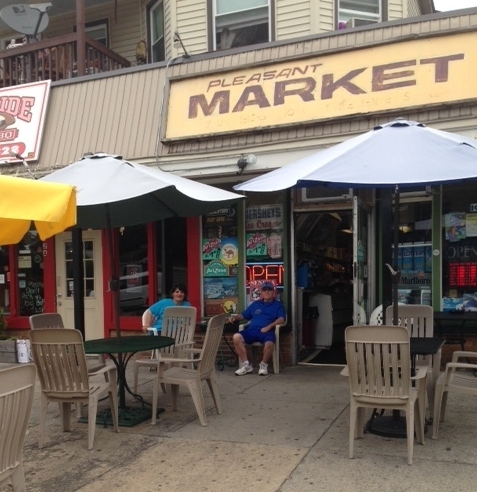 George and Maria walk the half block from their house in the early morning to open up the Pleasant Street Market for the first-of-the-day customers. I pass by them a bit shy of 6 am on my walk. They always sit with their coffee at this table. We smile and shout out our hellos. (Photo by Joyce Mandell)