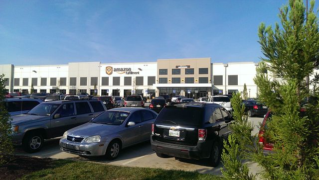 An Amazon fulfillment center and accompanying parking lot. Source: Lvi56