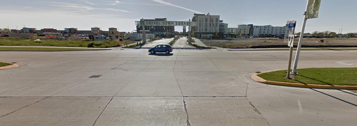 A view of the town square entrance under construction from late 2016. Click to view larger. (Image from Google Maps)