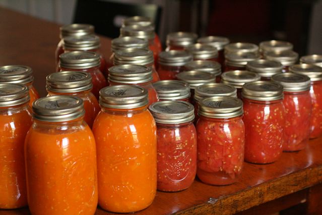 Canning tomatoes. (Source: TheBittenWord )