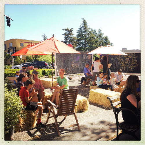 Residents of Sebastopol enjoy some share in a parklet on a hot day. (Source: Paul Fritz)