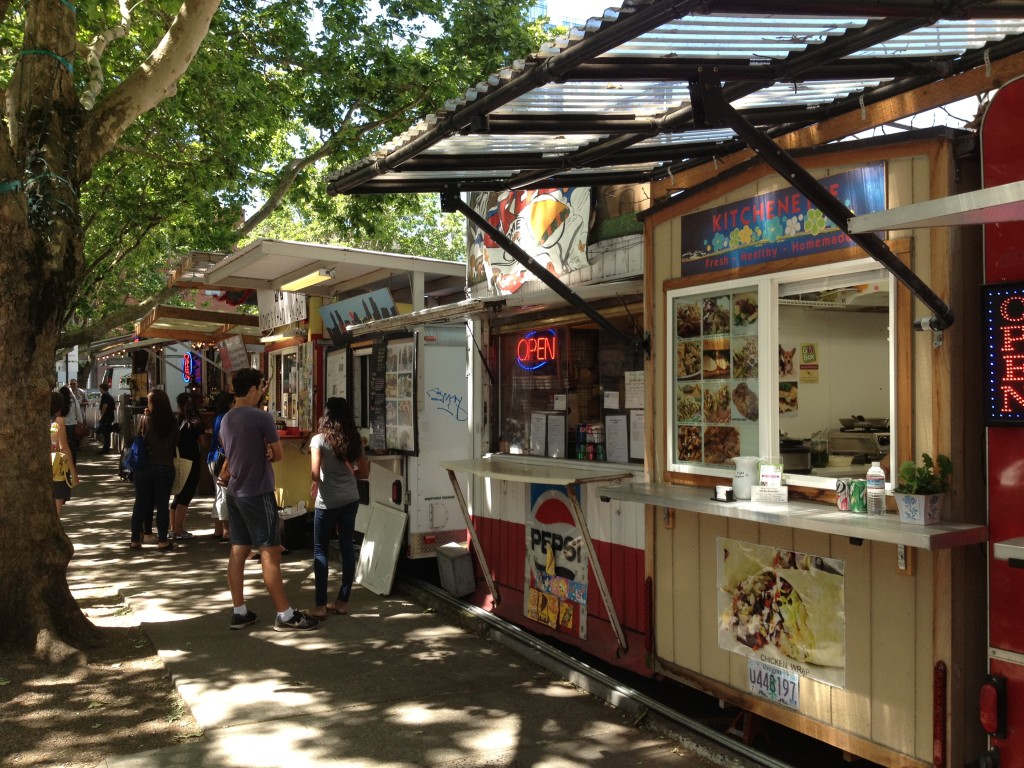 Food court lining a surface parking lot in Portland, OR (Photo by Sarah Kobos)