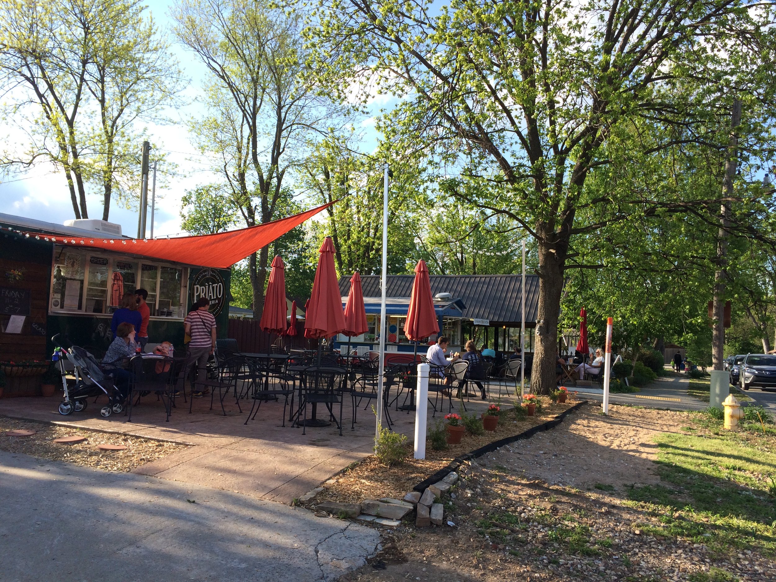 Canopies and umbrellas welcome folks in Bentonville, AR (Photo by Sarah Kobos)
