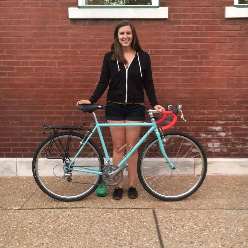Kea, with one of her many money-saving tools: a bike!