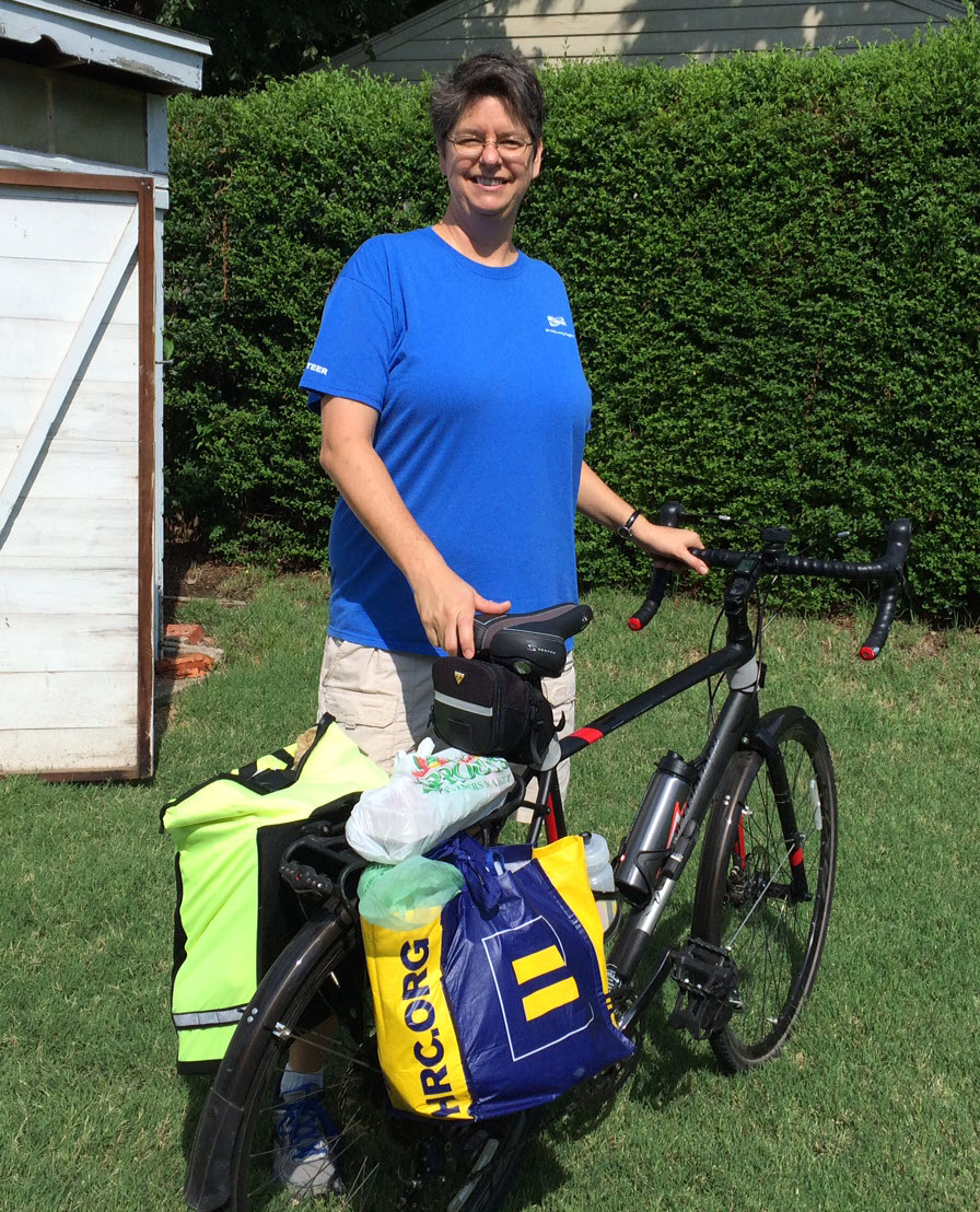 The author, back from the store, with eggs on the rear rack. (Photo by Cathy Wiedenhoeft.)