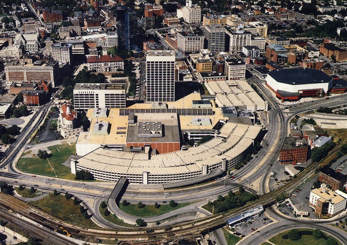 Symbol #2 of the automobilization of Worcester: The Worcester Center Galleria completed in 1971, greeted train passengers with a huge parking garage. Now, there was no pedestrian access from Union Station to the core of downtown. The mall was ringed by Foster Street widened into a four lane "highway" that was almost impossible to cross. The message was clear: This city was now going to be designed for cars, not pedestrians or train-goers. The mall also helped kill the street life in the rest of downtown. Now, people could drive, shop and then leave without ever stepping foot on a downtown outdoor sidewalk.