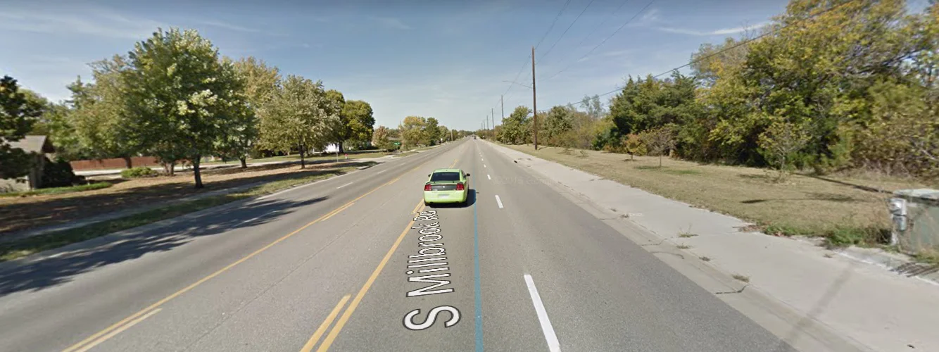 The scene of Saturday's deadly crash. A desolate stretch of overbuilt road with highway design principles applied to a corridor serving neighborhoods.