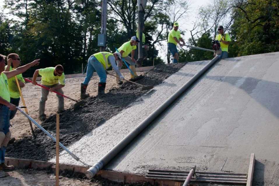 Volunteers work to restore velodrome paving (Source: Penrose Park GoFundMe page)