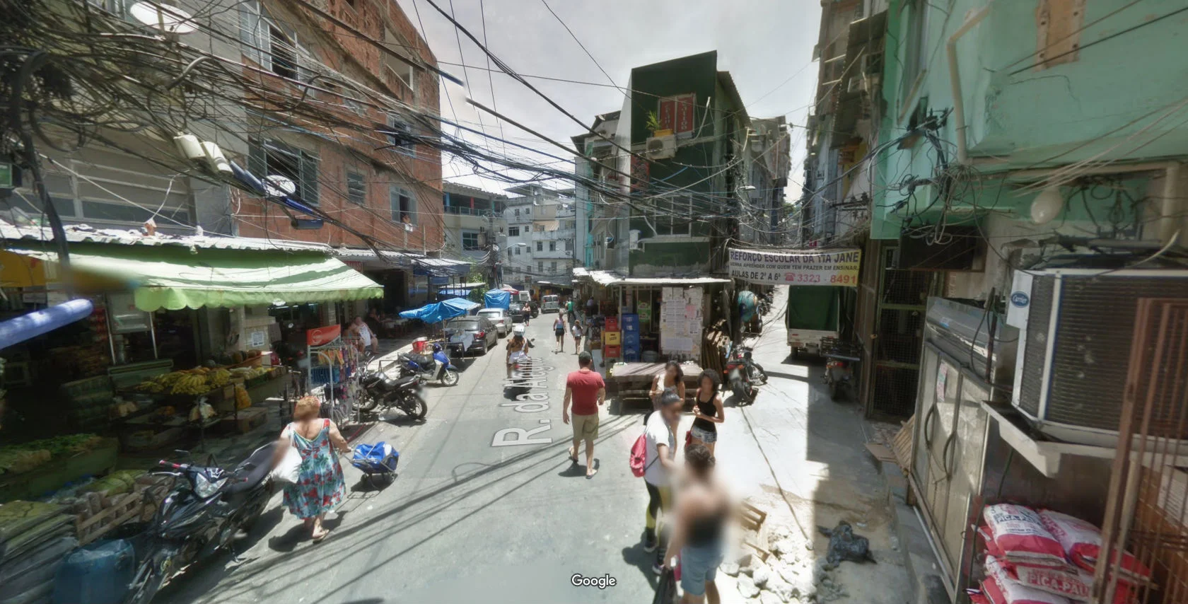 Rocinha , Rio de Janeiro, Brazil. These people are considered poor by first world standards. Why is our reaction to demolish their homes and prevent this kind of development? (Source: Google Maps )
