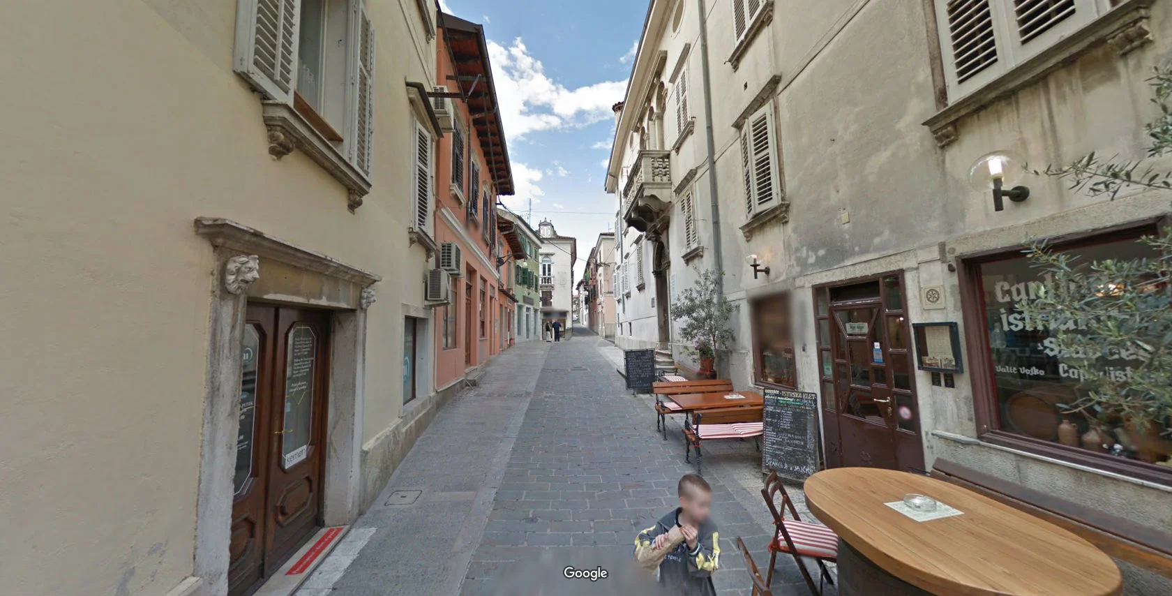 Koper, Slovenia. Not much different from a favela except they were able to afford fancier architecture, so we have a habit of glass casing places like this while also killing the systems that allowed these places to emerge. (Source: Google Maps )