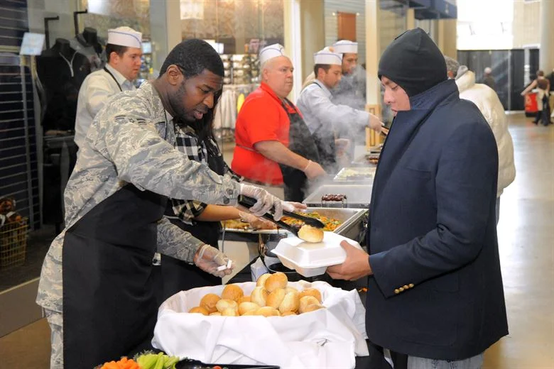 Utah residents in need receive a hot meal on Thanksgiving (Source: U.S. Air Force photo by Todd Cromar)