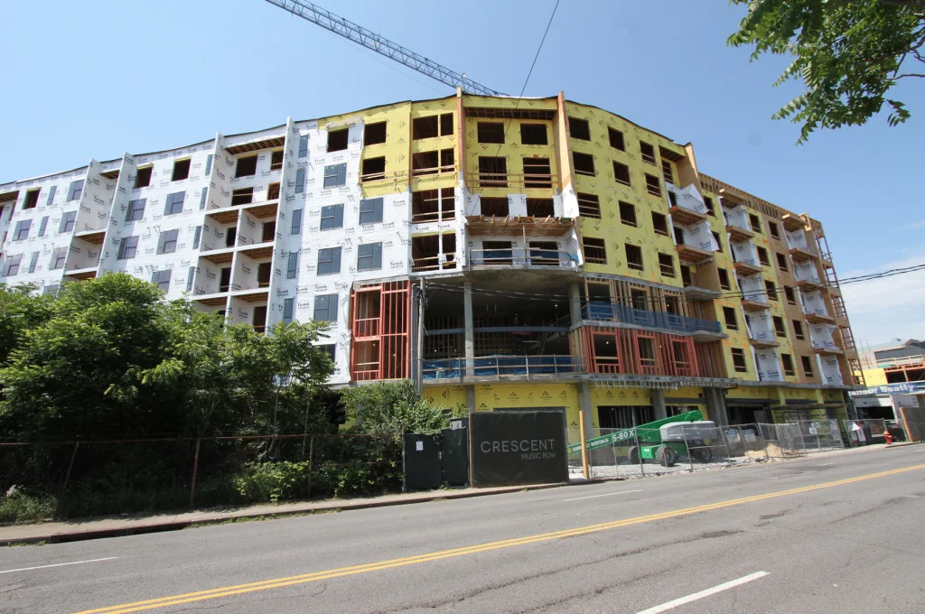 A big developer that can afford to build apartments of this size can also afford to let the mandatory commercial space on the bottom floor sit vacant. (Source: Johnny Sanphillippo)