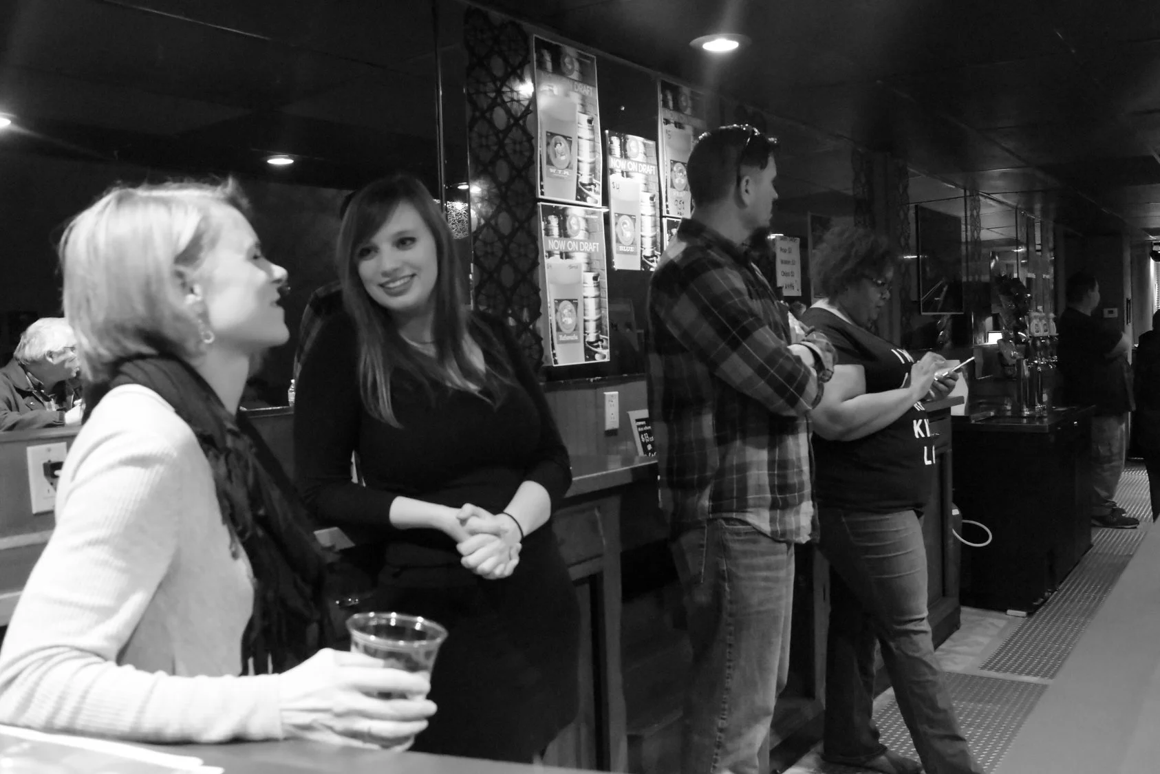 Akron residents enjoy a night out at the Live Music Now! pop-up space.