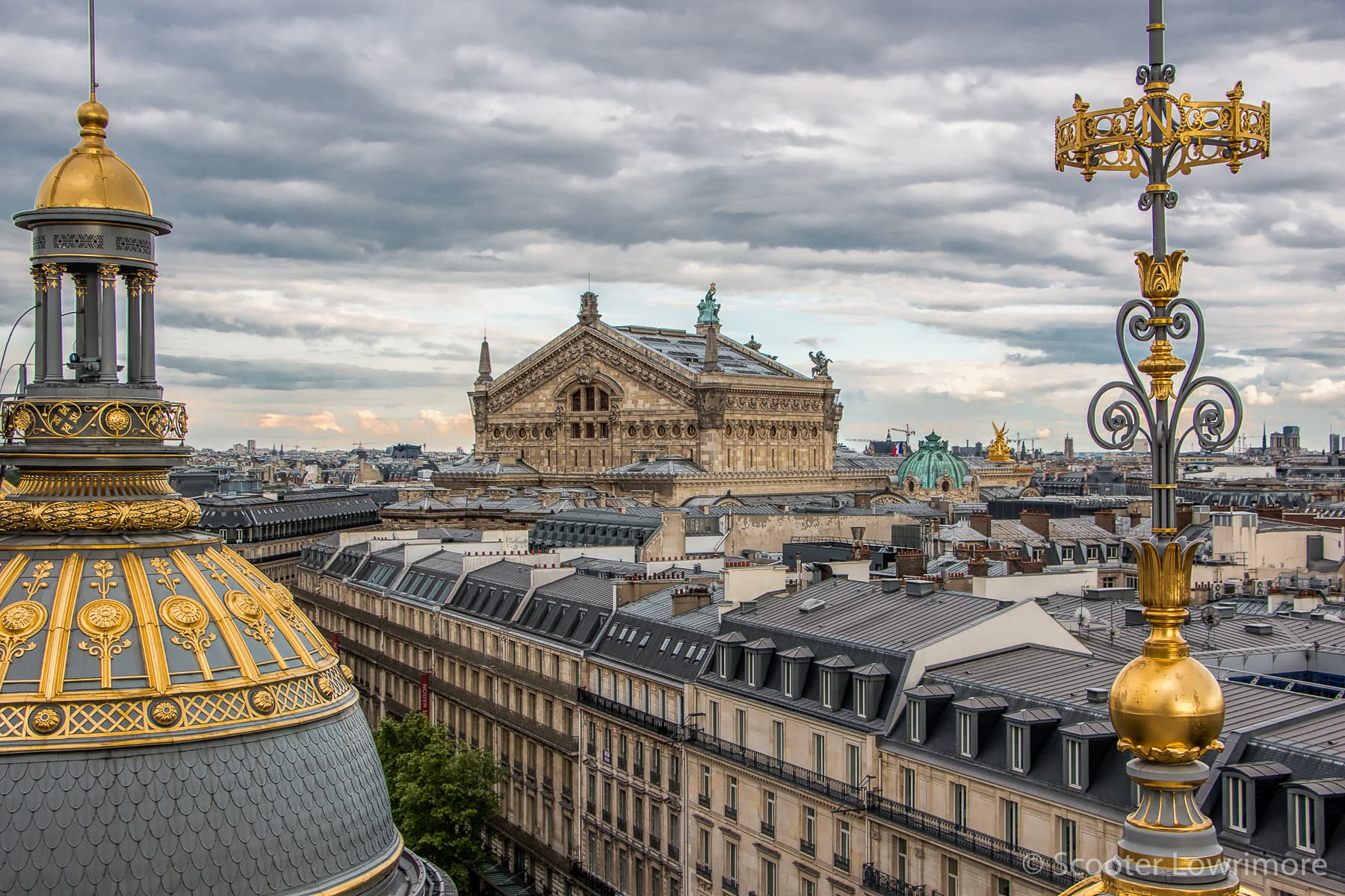 The classic roof design on Paris buildings is partly the result of taxation laws created in the 17th century. (Source: Scooter Lowrimore )