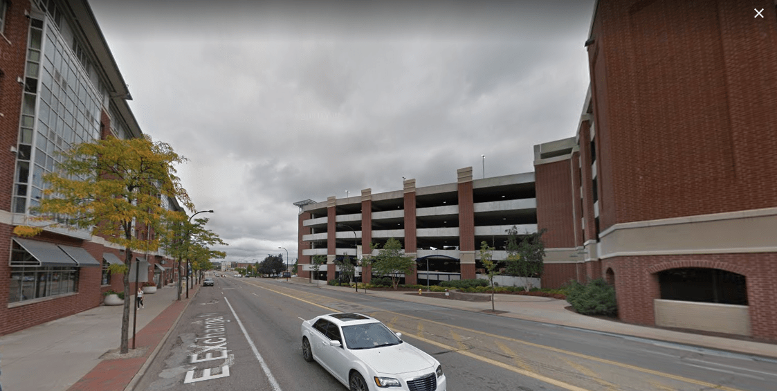 Large auto-oriented university dorms and parking ramps flank this fast-moving stroad with little in the way of street-level activity or life. (Source: Google Maps)