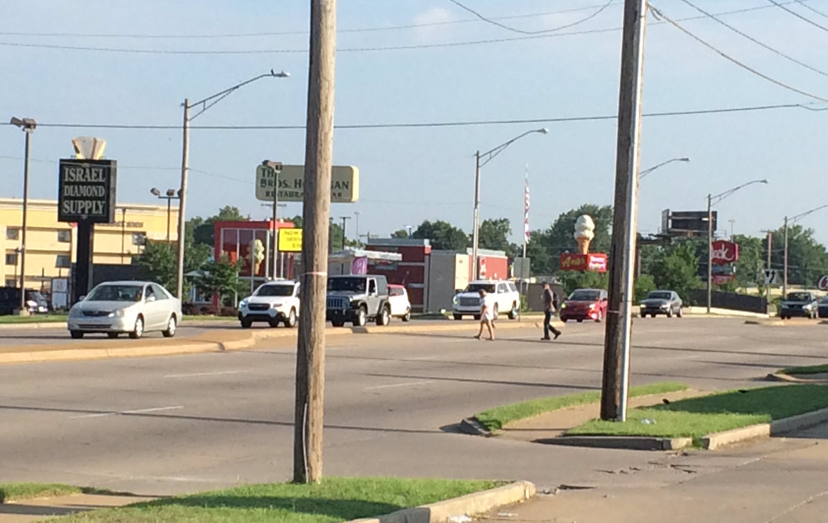 Mid-block crossings are scary, but at least the cars are only coming from two directions. Photo by Sarah Kobos