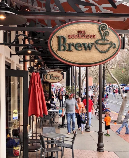 Local businesses liven up a downtown street.