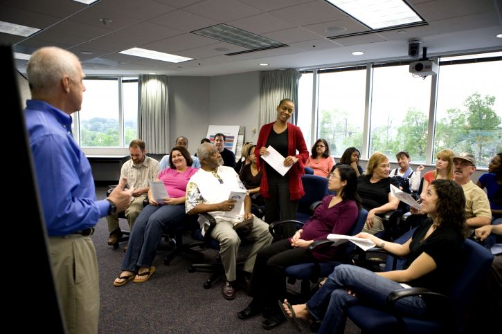 Community members at a town hall meeting. Source: Pixnio.