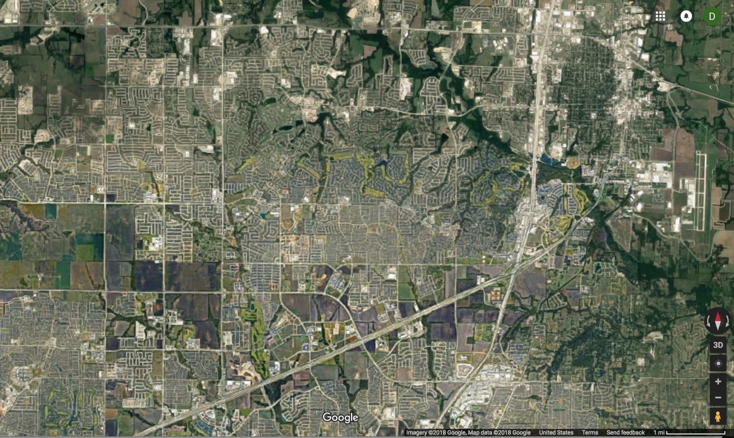 Nearly all traffic is funneled onto the grid of major arterial roads visible in this photo; note also the segregation of residential subdivisions from commercial areas. (Image source: Google)