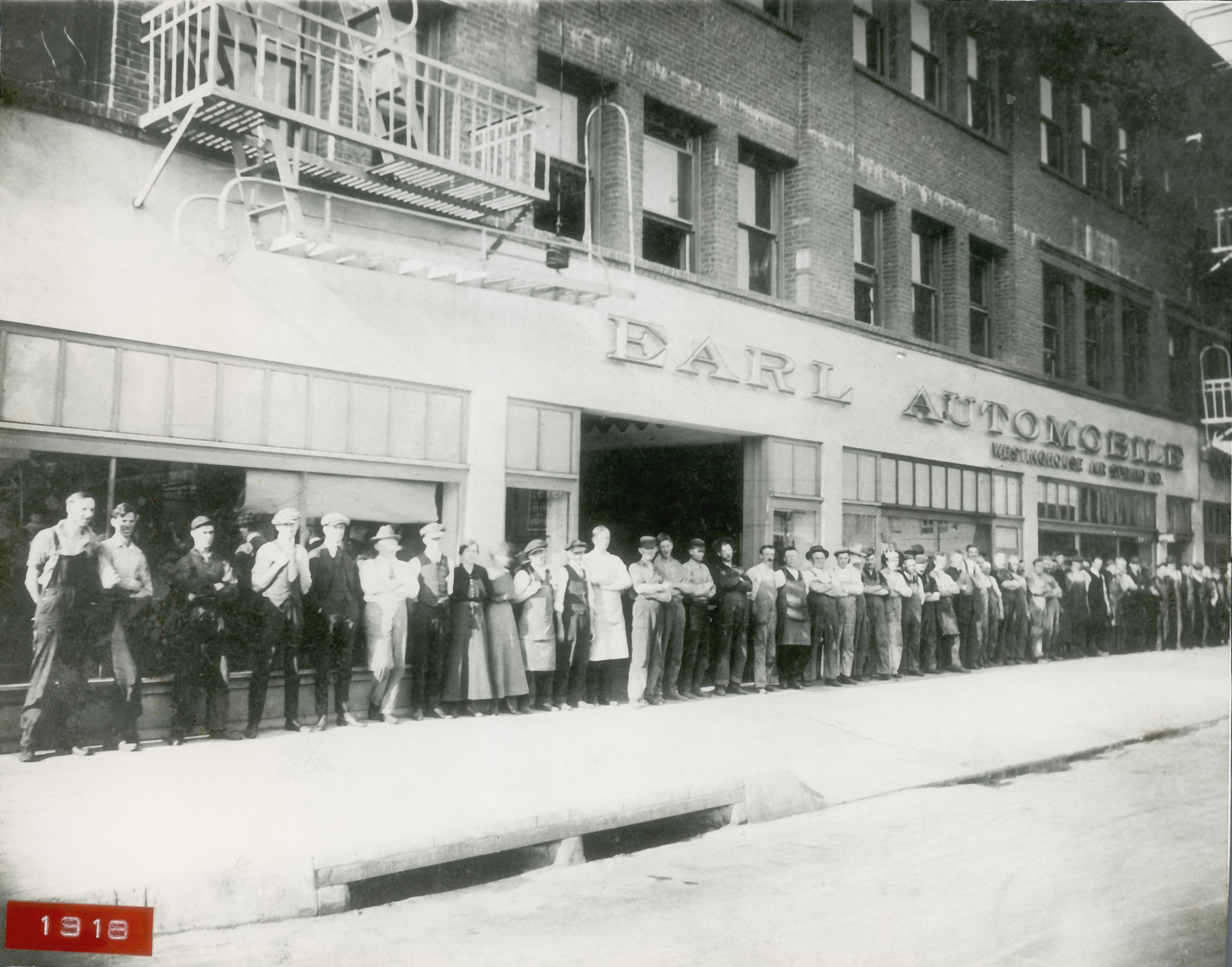 Employees of Earl Automobile Works in Los Angeles in 1918. Harley helped his father, J.W., build the former carriage repair shop into the sixth-largest maker of auto bodies in the country.