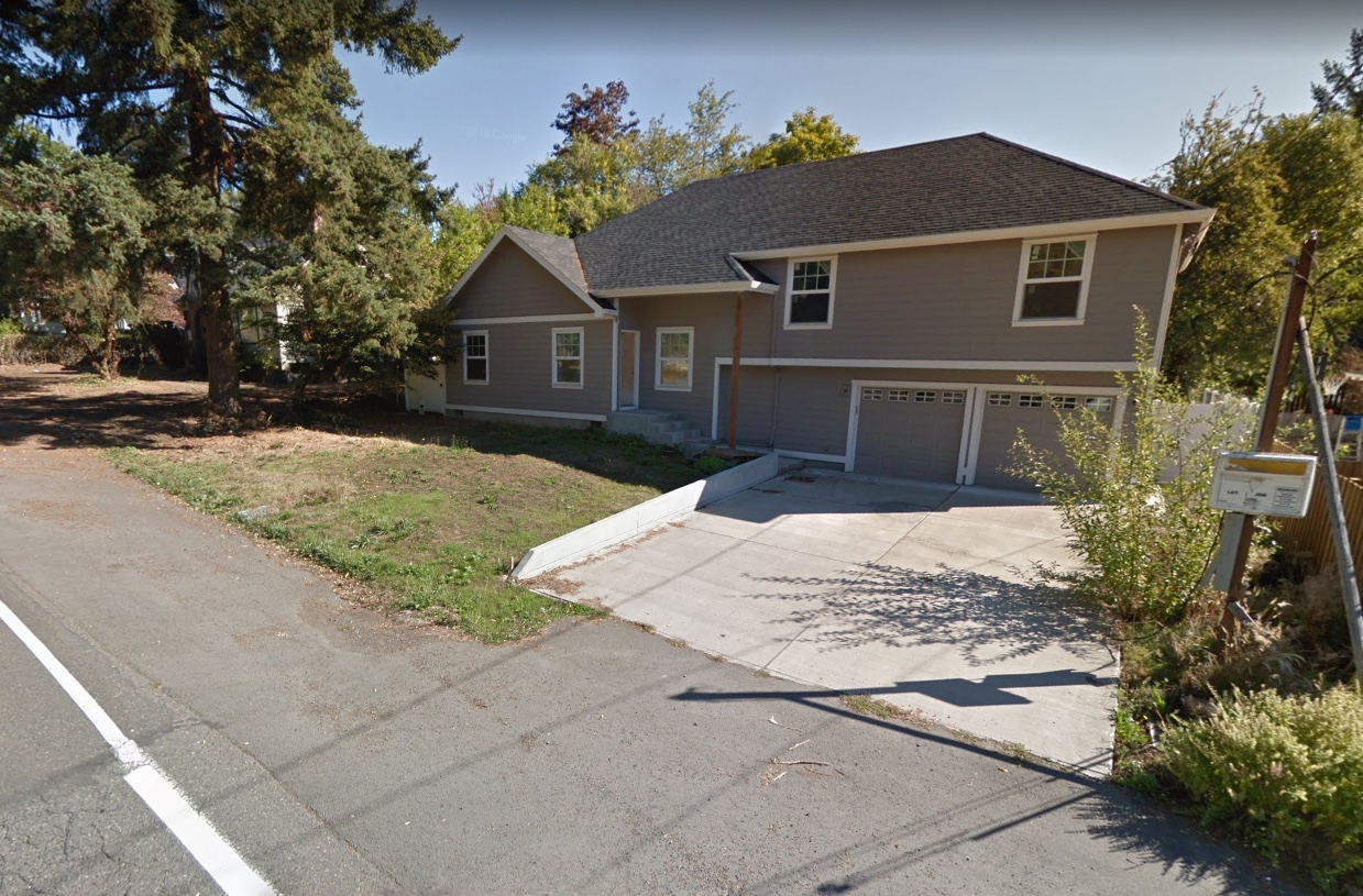 A house built in 2015 on Southwest Capitol Hill Road, a five-minute walk from a proposed rail station. When this is the only sort of home that's legal, it's the only sort of home we'll get. Photo by Google Maps.