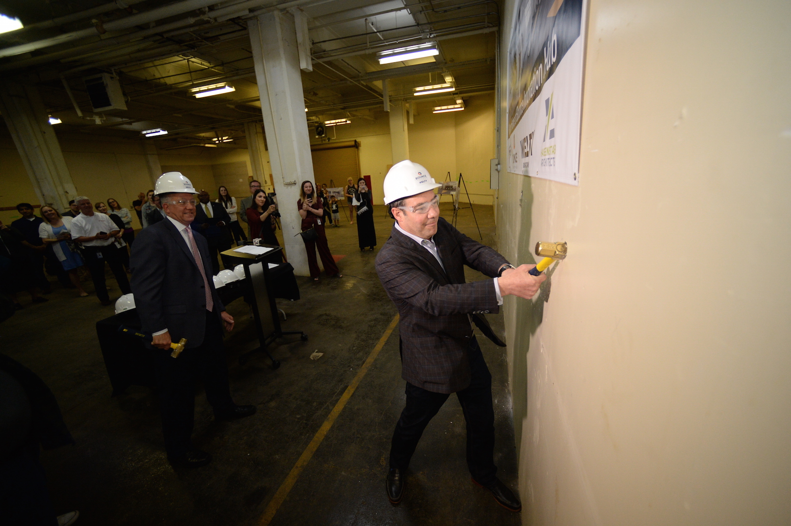 First floor wall-breaking ceremony with Doug Weintraub and Akron mayor Dan Horrigan