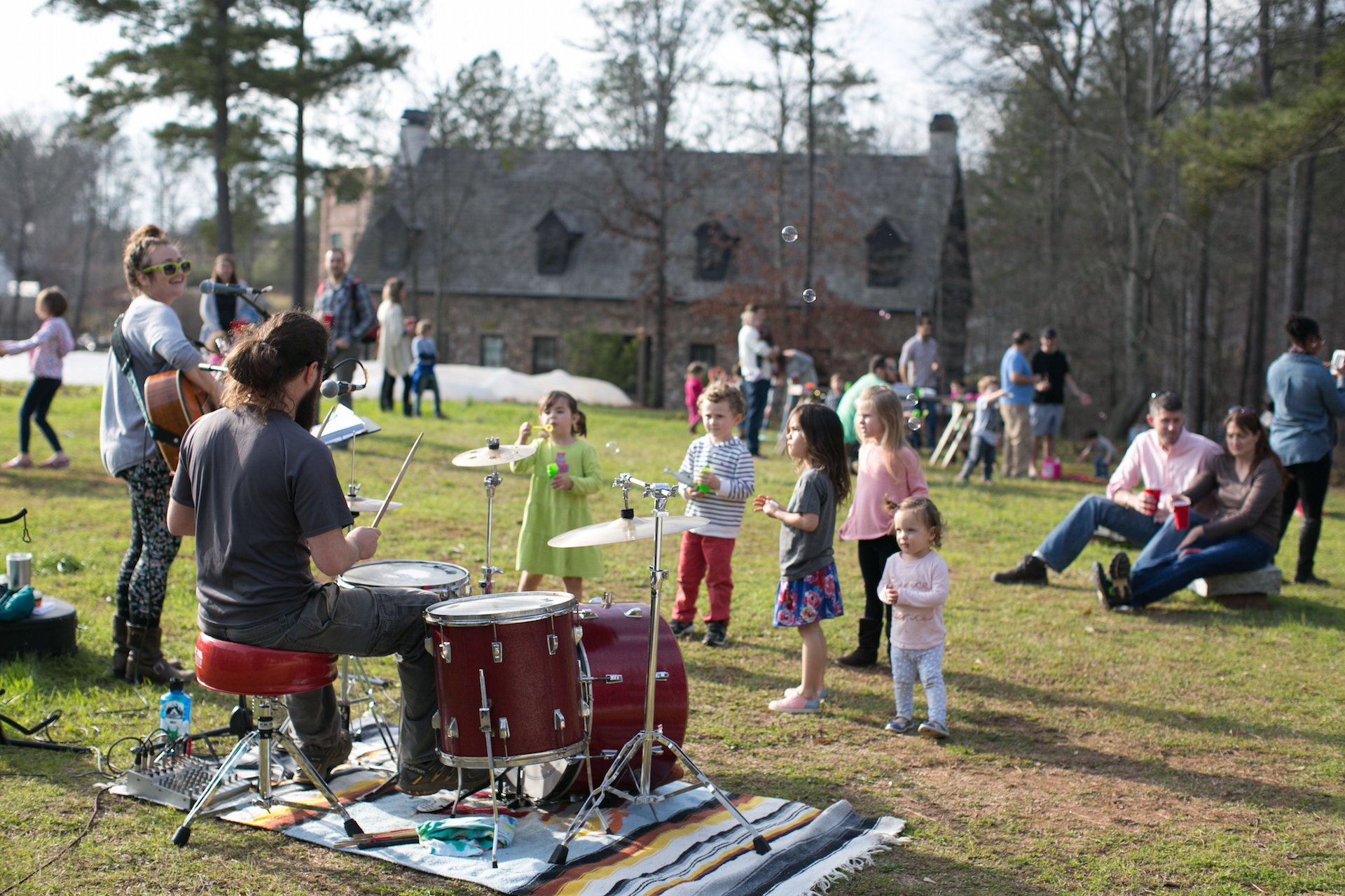 Spring farm party in Serenbe—a working farm is embedded in the community and offers a community-supported agriculture (CSA) program that many residents participate in.