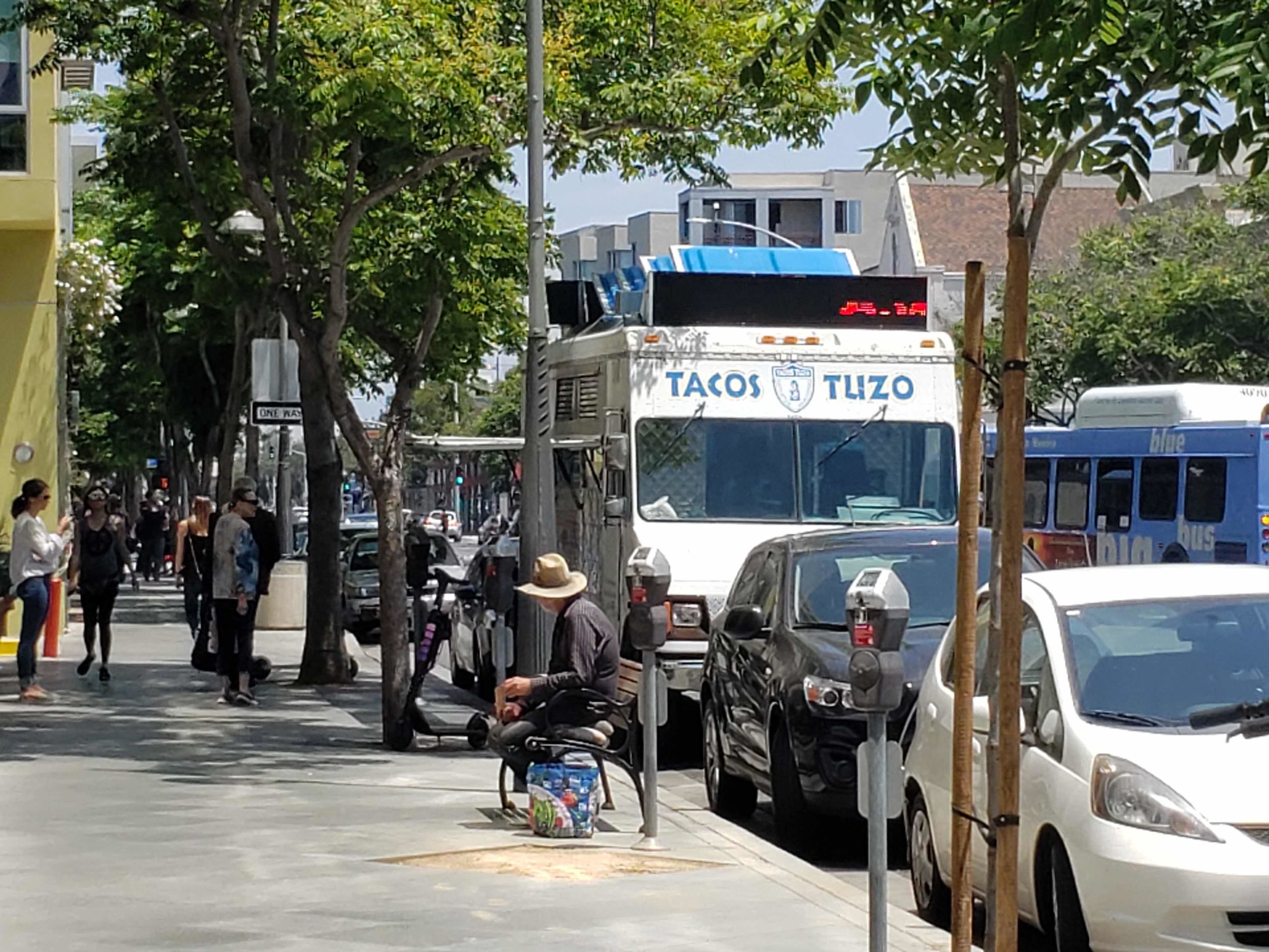 Food trucks are one of many low-cost, bottom-up adaptations to a car-oriented environment that effectively build walkability into a range of neighborhoods. (Photo by Daniel Herriges)