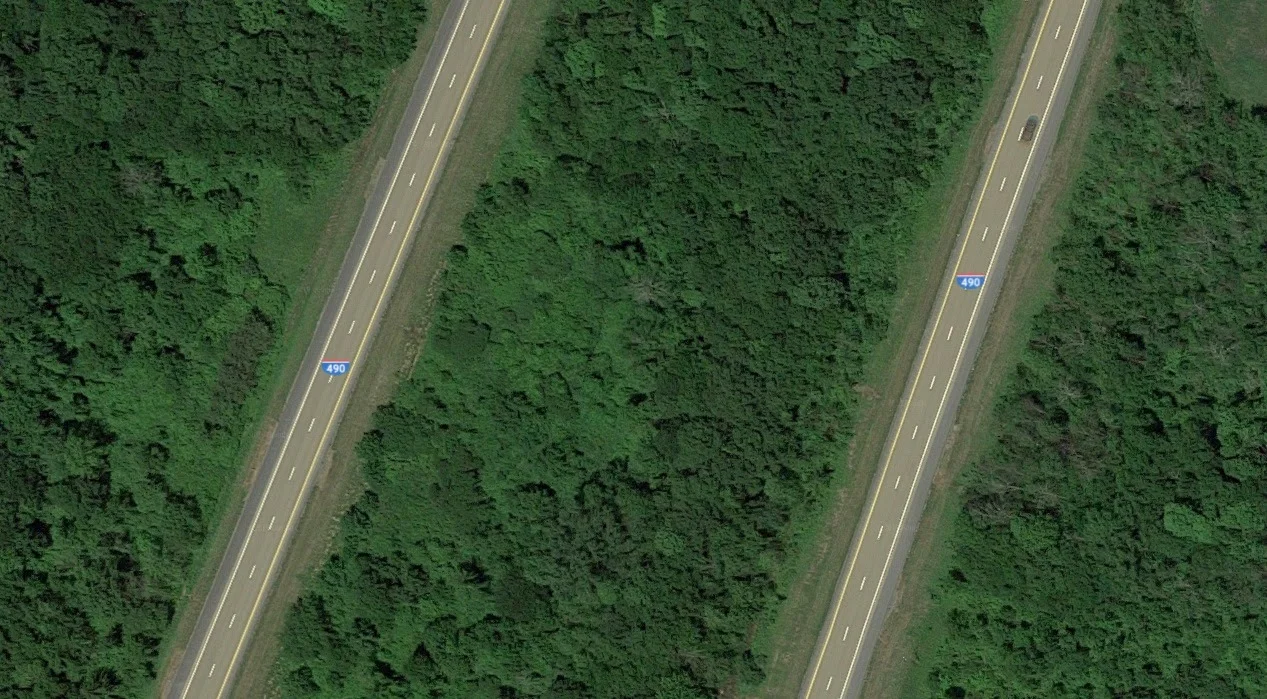 A Google Satellite view of I-490 near the I-90 interchange