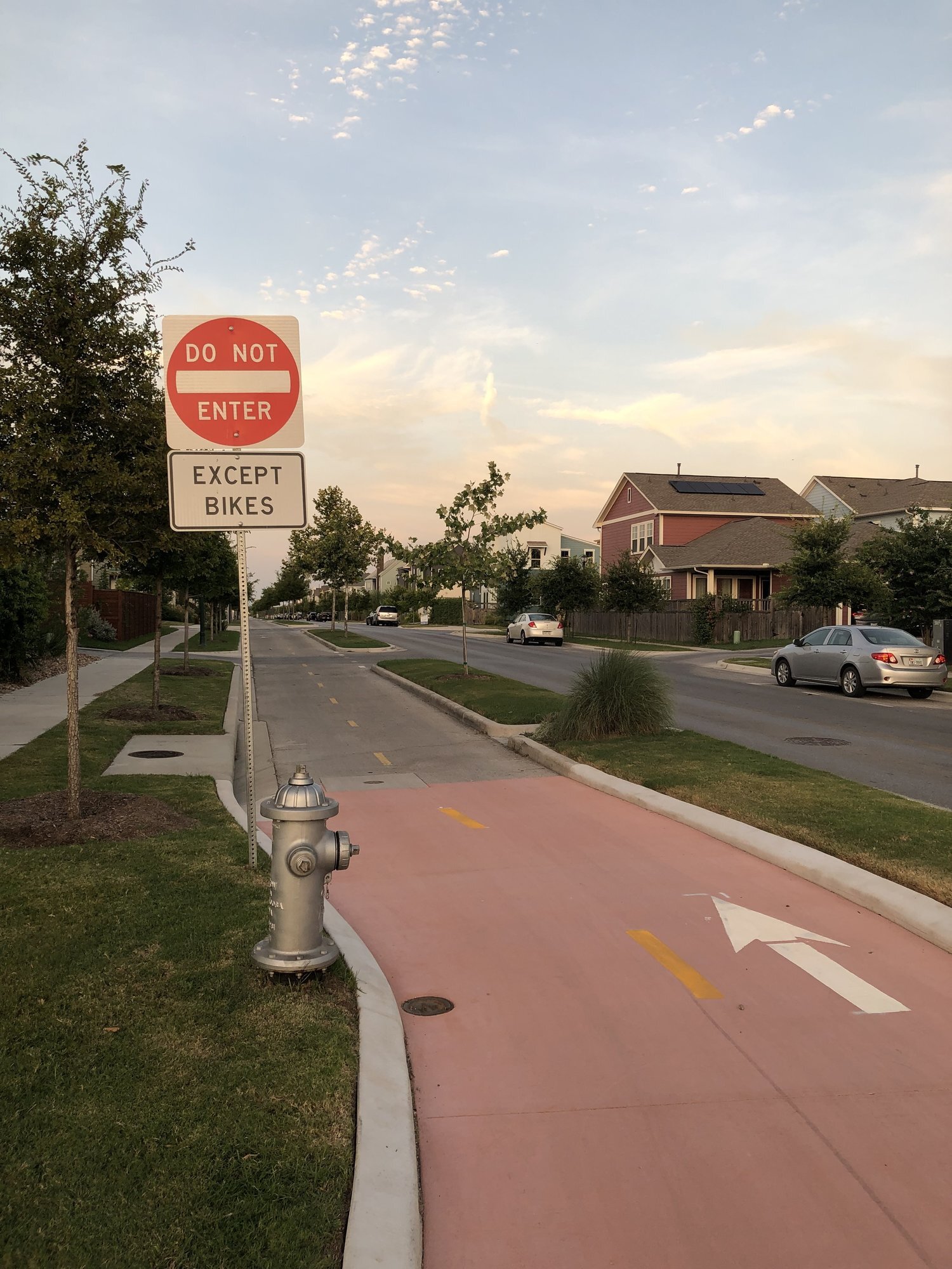 A great example of a fully protected bike lane outside of downtown can be found in Mueller